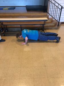 Participant completing push ups 
