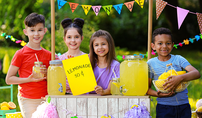 A lemonade stand is a fun school fundraising idea that puts your students in charge.